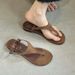 New Summer Flip-Flop Sandals Versatile 2026 Roman Style Black Beach Fairy Flat Retro Vacation Shoes_vogvips.com