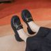 A Woman With A Small Leather Shoe With A Horse Bite And A Pair Of Shoes With A Single Shoe And A Woman In Soft Leather Flat Loafers_vogvips.com