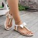 Cross-border Roman Flat Women's Sandals 2026 Summer New European And American Large Size Pearl Bowknot Thong Fashion_vogvips.com