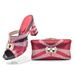Plus-size women's chunky and rhinestone slippers paired with a dinner party clutch set_vogvips.com
