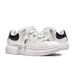 White Sneakers With Black Accents And Chunky Laces: A Fusion Of Playful Style And Daily Versatility_vogvips.com