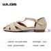 WLQS Genuine Leather Women's Flat Sandals Hollow Out Design Summer Breathable Casual Non-slip Shoes_vogvips.com