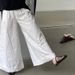 Gravity Niche Fish Net Woven Hollow Sandals For Women 2025 Summer New Fisherman Flat Bottomed Round Toe Half Slippers_vogvips.com