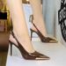 European and American fashion super high heels women's metal pointed back empty slim heels women's shoes hollow back trip strap single shoes_vogvips.com