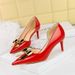 638-AK68 European And American Fashion Party Heels Stiletto Patent Leather Pointed Toe Metal Bow Side Hollow High Heel_vogvips.com
