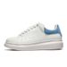 All-White Platform Sneakers With Silver Accents: A Fusion Of Minimalist Elegance And Street Style"_vogvips.com