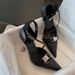 Huidong Women's Shoes Wholesale Pointed Toe High Heels 2021 New Summer Hollow Black Irregular Heel One-Piece_vogvips.com
