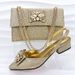 Women's shoe bag set gold pointed low heel rhinestone metal buckle decoration suitable for banquets and everyday_vogvips.com