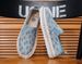 .A Man Is Wearing A Pair Of Slippers Made Of Plush Fabric, A Pair Of Casual Canvas Shoes Made Of Linen, And A Pair Of Men's Slippers._vogvips.com