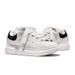 White Sneakers With Black Accents And Chunky Laces: A Fusion Of Playful Style And Daily Versatility_vogvips.com