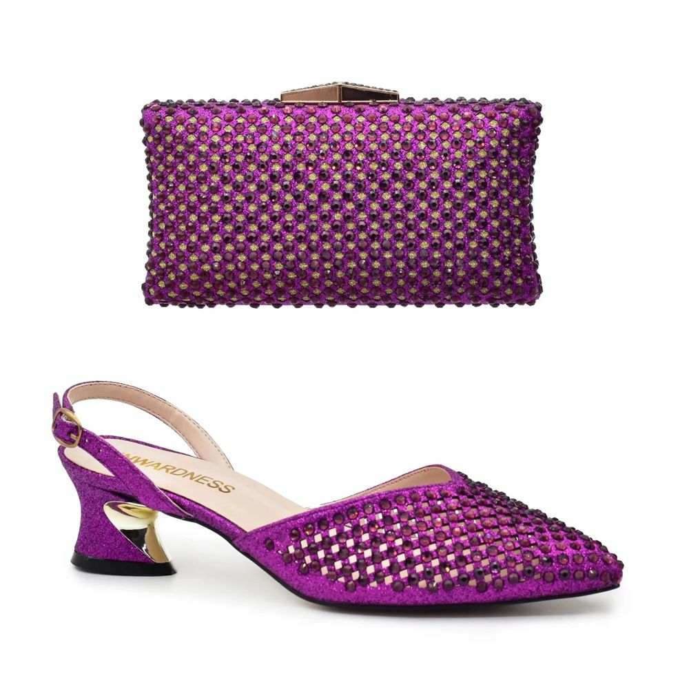 The new laser perforated iron diamond shoes bag matching women's suit fashion_vogvips.com
