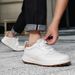 New Genuine Leather Business Men's Casual First Layer Cowhide Small White Shoes Wide Foot Rotating Button Comfortable_vogvips.com