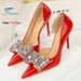 2025 Hot-Selling New Womens Pumps Red Glossy Patent Leather Side Hollow Rhinestone Bow Ladies Banquet High Heels Versatile Shoes_vogvips.com