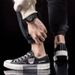 Bear cartoon canvas shoes low top teenage student men's shoes 2024 new trend everything soft sole breathable board shoes_vogvips.com