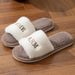 New Winter Indoor And Outdoor Plush Warm One-Word Cotton Slippers For Women Creative Personality Embroidered Soft Sole_vogvips.com