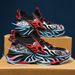 2025 New Chinese Red Shoes Couple Running Shoes Light Non-Slip Shock Absorption Breathable Flying Woven Sports Trendy Shoes_vogvips.com