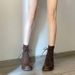 So Beautiful! High Quality! A Woman In Vintage Dr. Martens Boots That Accentuates Her Long Legs_vogvips.com