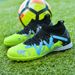 New camouflage high top football shoes broken nails long nails children's professional training shoes burst football shoes_vogvips.com