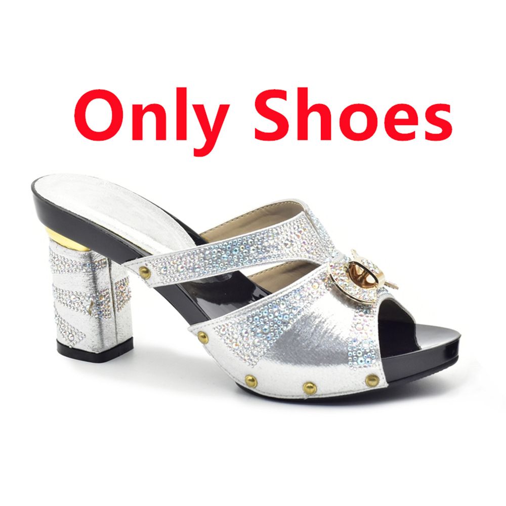 Plus-size women's chunky and rhinestone slippers paired with a dinner party clutch set_vogvips.com