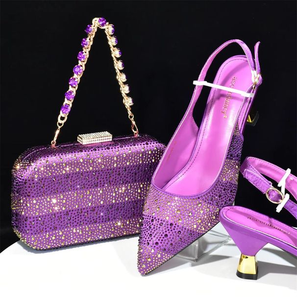 Accessorize the evening with shredded diamond embellished high-heeled sandals and a hard-box handbag set_vogvips.com