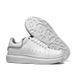 All-White Platform Sneakers With Silver Accents: A Fusion Of Minimalist Elegance And Street Style"_vogvips.com