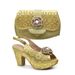 For the dinner party, pair stereo parquet beaded chunky sandals with the same color point diamond handbag set_vogvips.com