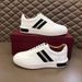 2025 New Men's Genuine Leather Thick Sole Lightweight Striped Non-Slip Casual Sneakers Versatile Board Shoes_vogvips.com