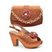 For the dinner party, pair stereo parquet beaded chunky sandals with the same color point diamond handbag set_vogvips.com