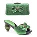Accessorized high heels with bows Accessorized evening sandals with clutch shoe bag set_vogvips.com
