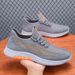 Men's 2026 Summer New Fashion Casual Foreign Trade Fly-knit Mesh Shoes Wholesale Breathable Solid Color Sneakers_vogvips.com