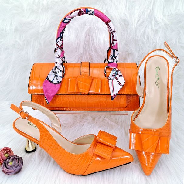 Women's pointed toe shoe and bag set, ribbon decoration, metal heels, shallow sexy high heels, simple handbag_vogvips.com