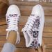2026 New Women's Large Flat Graffiti Canvas Shoes European And American Ethnic Style Lazy Canvas Shoes Lightweight And Durable Board Shoes_vogvips.com