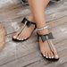 Cross-border Roman Flat Women's Sandals 2026 Summer New European And American Large Size Pearl Bowknot Thong Fashion_vogvips.com
