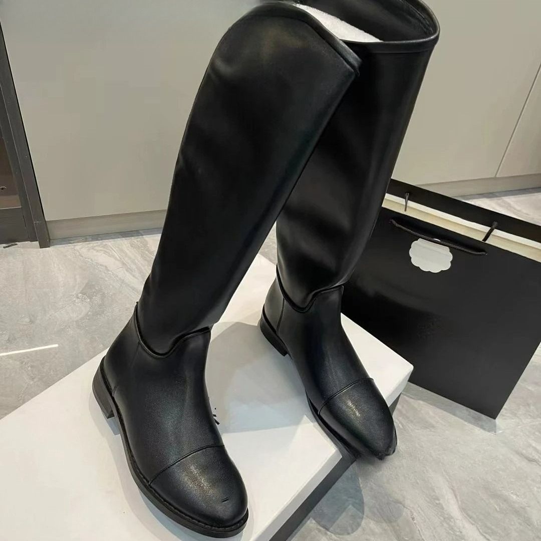 High Version Xiaoxiangfeng Black Flat-bottomed Boots Women's 24 New Round Head But Knee Boots Women's Tall Thin Boots_vogvips.com
