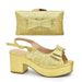 Bow embellish round head and tie thick sandals with the same color style dinner clutch bag_vogvips.com