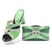 Plus-size women's chunky and rhinestone slippers paired with a dinner party clutch set_vogvips.com