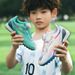 New rotary button children's soccer shoes students professional training shoes TF broken nails boys and girls soccer shoes_vogvips.com