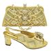 Accessorize the party with a bow with a shredded diamond round head fish mouth square and sandals with the same style clutch_vogvips.com