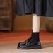 A Woman With A Small Leather Shoe With A Horse Bite And A Pair Of Shoes With A Single Shoe And A Woman In Soft Leather Flat Loafers_vogvips.com