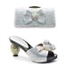 Accessorized high heels with bows Accessorized evening sandals with clutch shoe bag set_vogvips.com