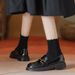 A Woman With A Small Leather Shoe With A Horse Bite And A Pair Of Shoes With A Single Shoe And A Woman In Soft Leather Flat Loafers_vogvips.com