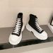 26ss High Canvas Top Four Seasons Men And Women Summer New Thick Bottom Board Heightened White Shoes Versatile_vogvips.com